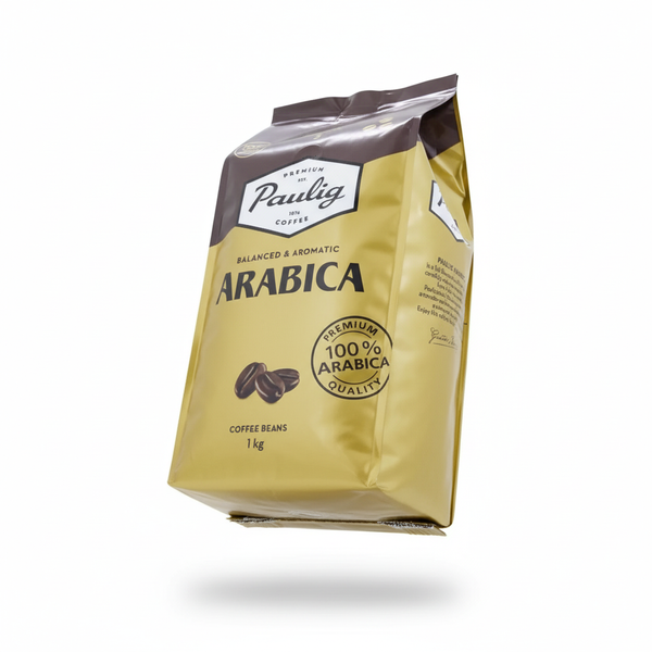 Фото упаковки Paulig Arabica Balanced & Aromatic. Желтый пакет с плавающей тенью на белом фоне.