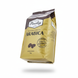 Фото упаковки Paulig Arabica Balanced & Aromatic. Желтый пакет с плавающей тенью на белом фоне.